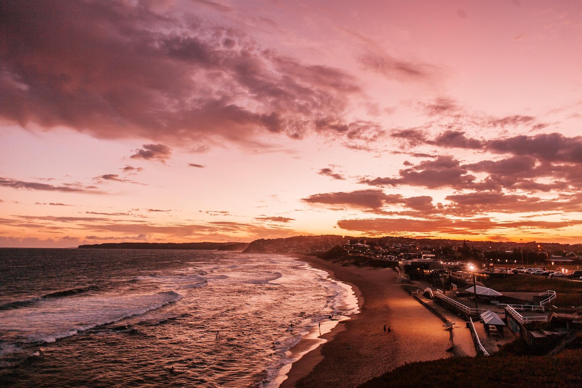 Newcastle's shoreline at golden hour.